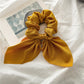 Festive Christmas Hair Accessories for Women: Colorful Hair Ties, Scrunchies, Headbands & Bows in Caramel & More